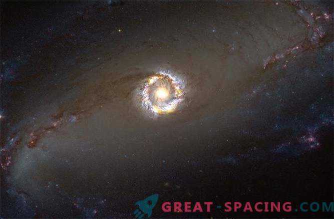 Como determinar o peso de um buraco negro - um monstro de uma galáxia espiral?